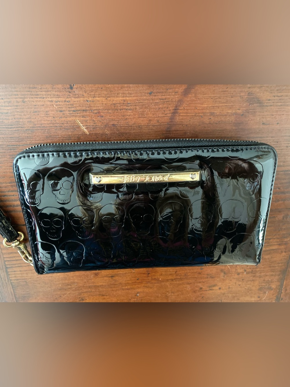 Betsey Johnson Black Patent Skull-Embossed Zip Wallet with Gold Plaque
